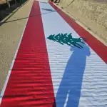 التحضير لرفع العلم اللبناني على واجهة سدّ القرعون