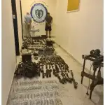 توقيف شخصَين ومصادرة أسلحة داخل مشغل في حارة حريك